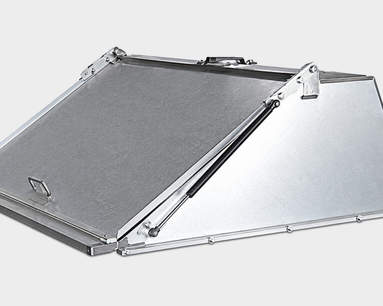 Metal sloped equipment cover with a hinged lid, handle, and gas strut support.