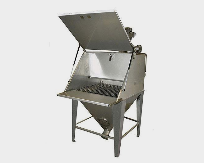 Industrial stainless steel dust extraction booth with an open top lid and a metal grate work surface.
