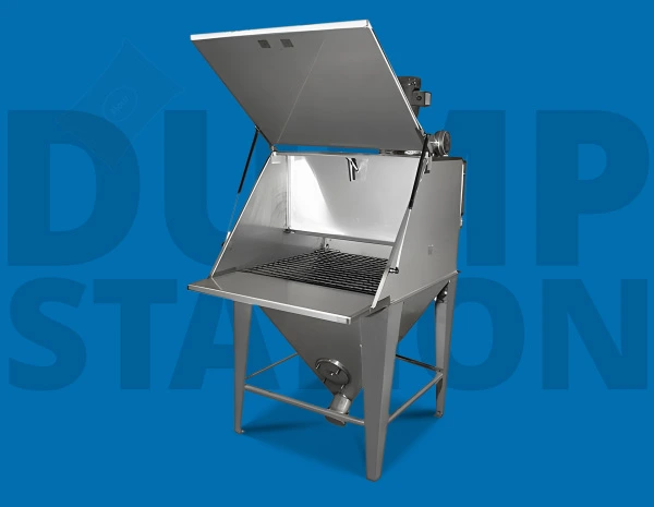 Stainless steel industrial dump station with an open top lid and a metal grate work surface.